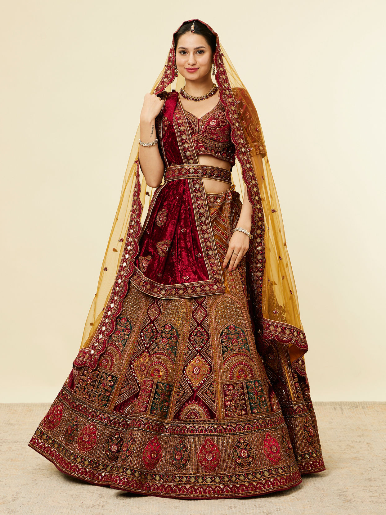 alt message - Mohey Women Mustard Yellow Maroon Buta Motif Lehenga image number 0